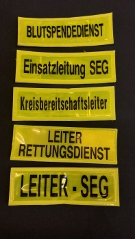 Preview: Brustschilder gelb, Sonderpreis, Reflexschild für die Brust, glänzende Brustschilder, Brustschild 15x5 cm, gelbes Reflexschild,