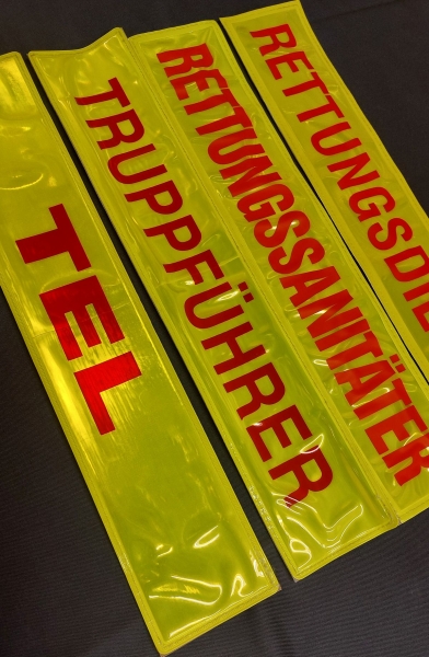 Rückenschild gelb/rot, Sonderpreisartikel, Rückenschild in gelb mit roter Schrift,