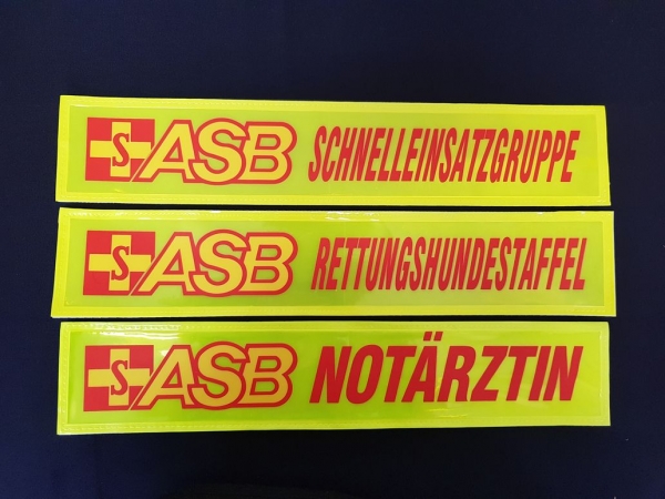 ASB-Rückenschild gelb, gelbes Schild mit ASB-Logo,